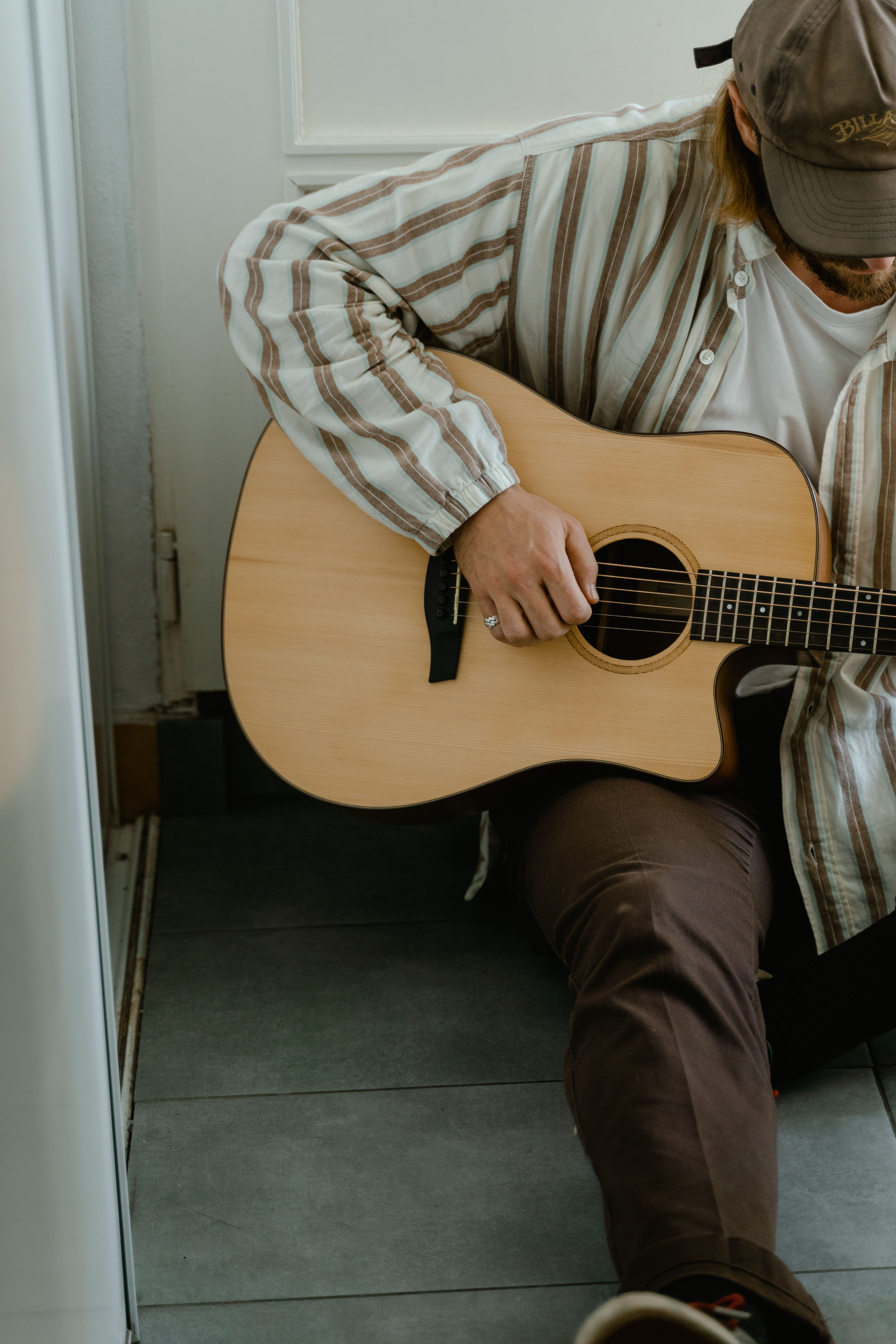 Person playing guitar